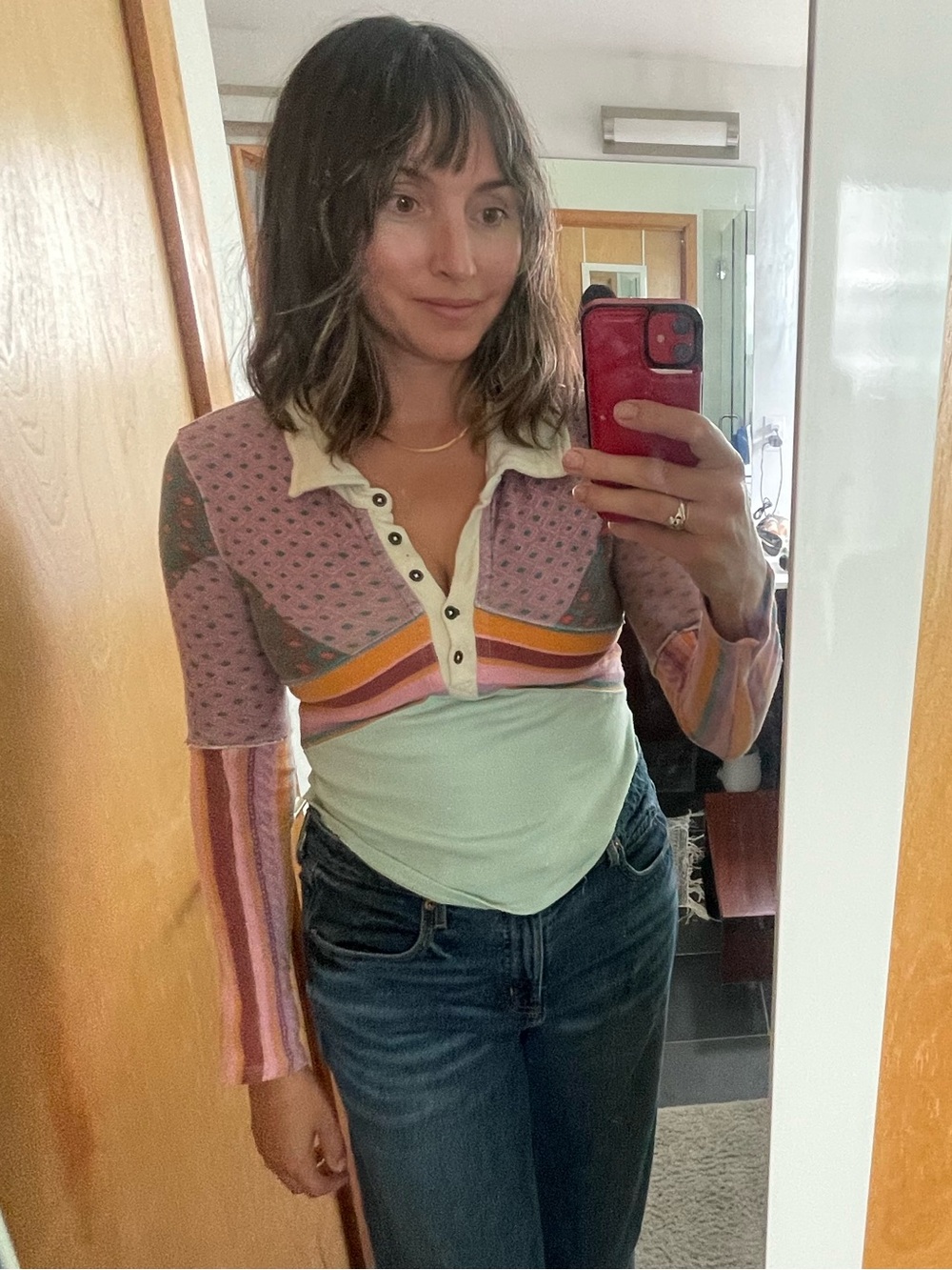 We The Free Pink Patchwork Cropped Polo with Multi-Stripe Accents